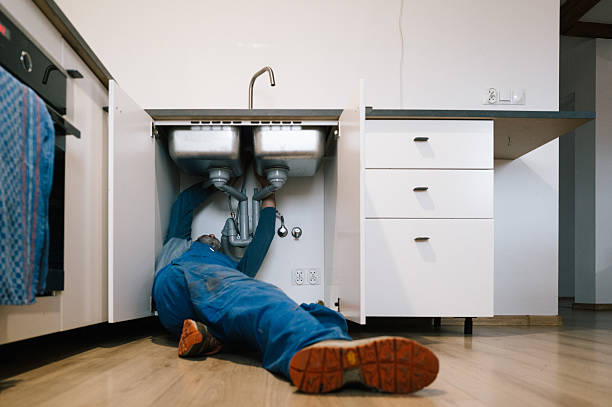 Professional Emergency Plumber technician working in Claxton, GA